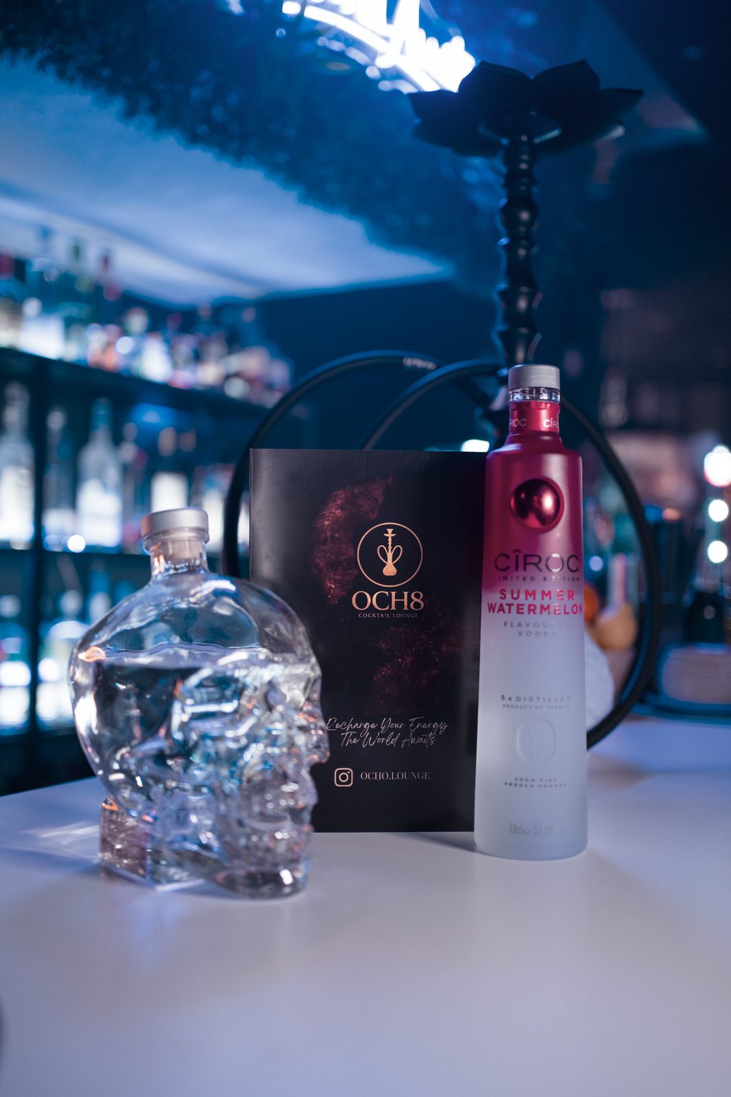 Botella premium en la barra de OCH8
